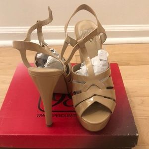 Beige platform sandals.